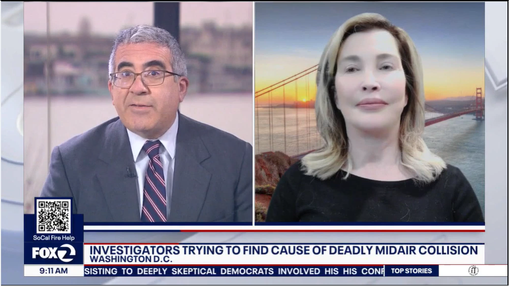 Split-screen TV news segment with a male anchor on the left and a female reporter on the right. Caption below reads: "Investigators trying to find cause of deadly midair collision Washington D.C.